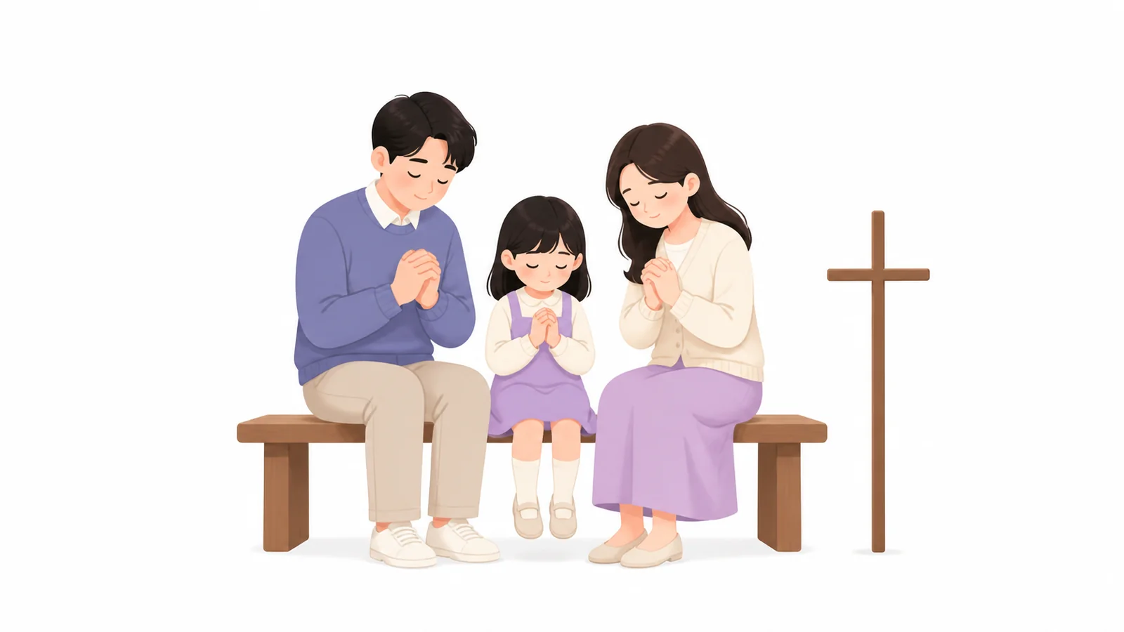 위령미사를 마치고 조용히 기도하는 가족