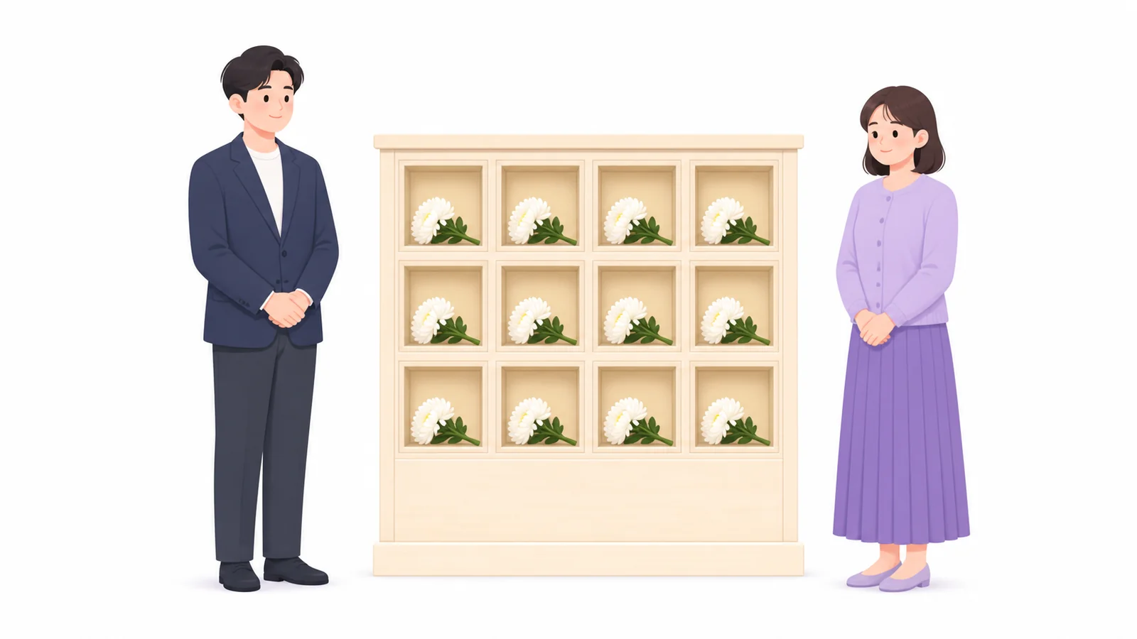 봉안시설 앞에서 국화를 들고 선 유족