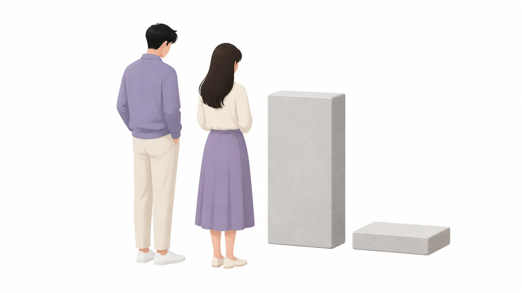비석과 상석이 놓인 자리를 바라보는 가족