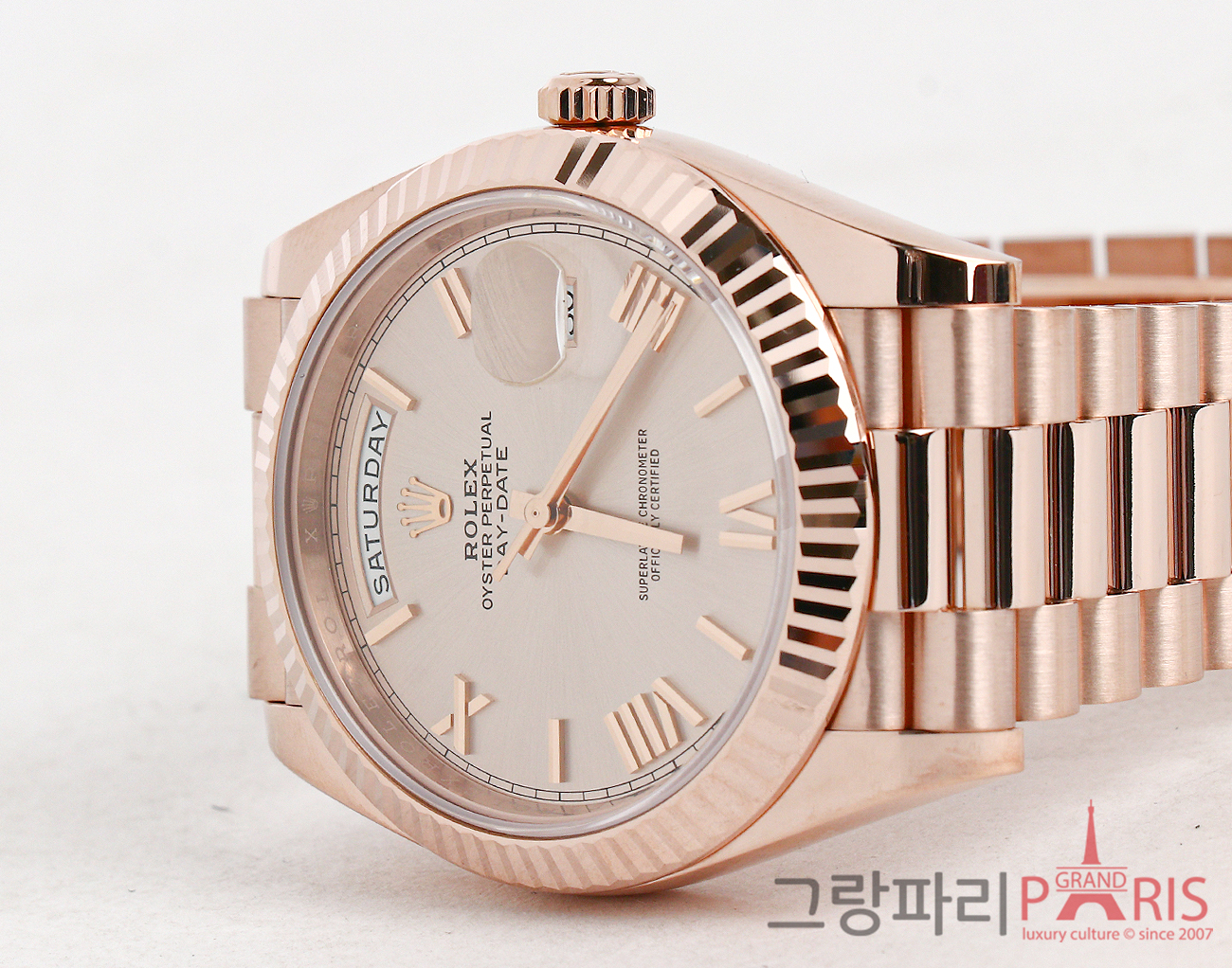 로렉스 데이데이트 40mm 로즈골드 선더스트 다이얼 228235