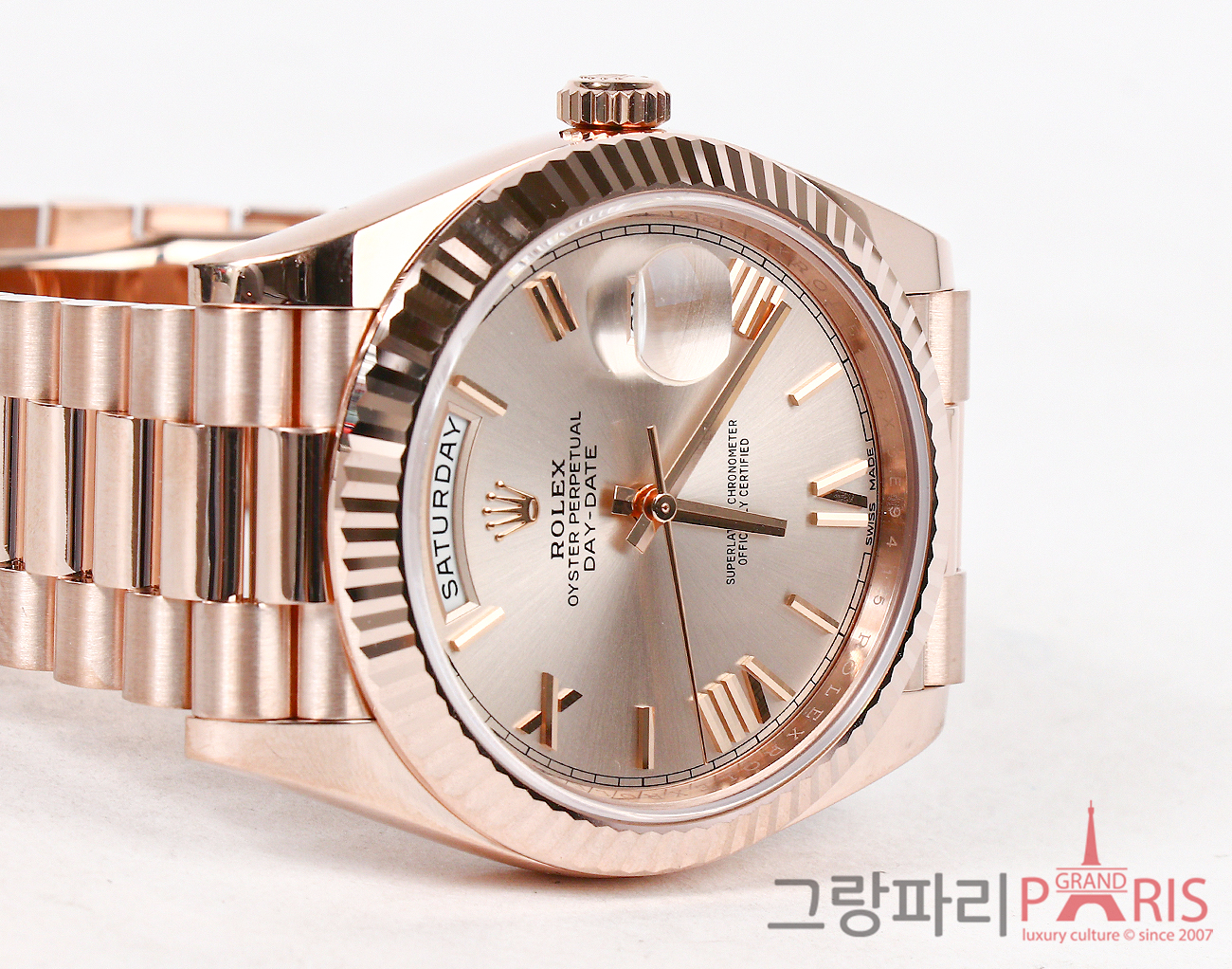 로렉스 데이데이트 40mm 로즈골드 선더스트 다이얼 228235