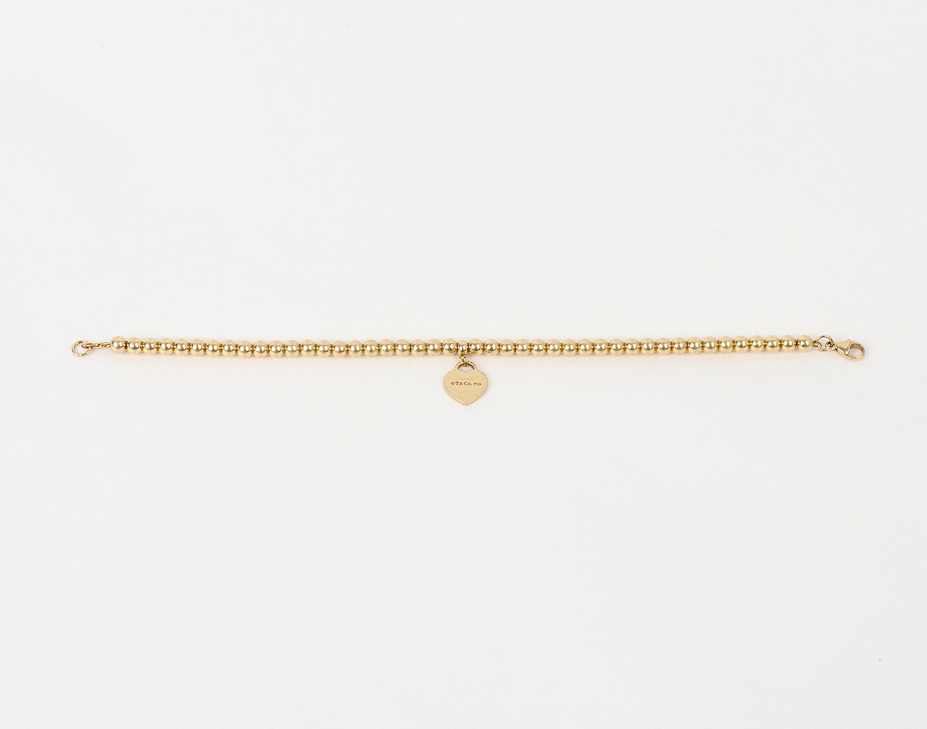 티파니앤코 리턴 투 티파니 미니 하트 태그 비드 브레이슬릿 옐로우골드