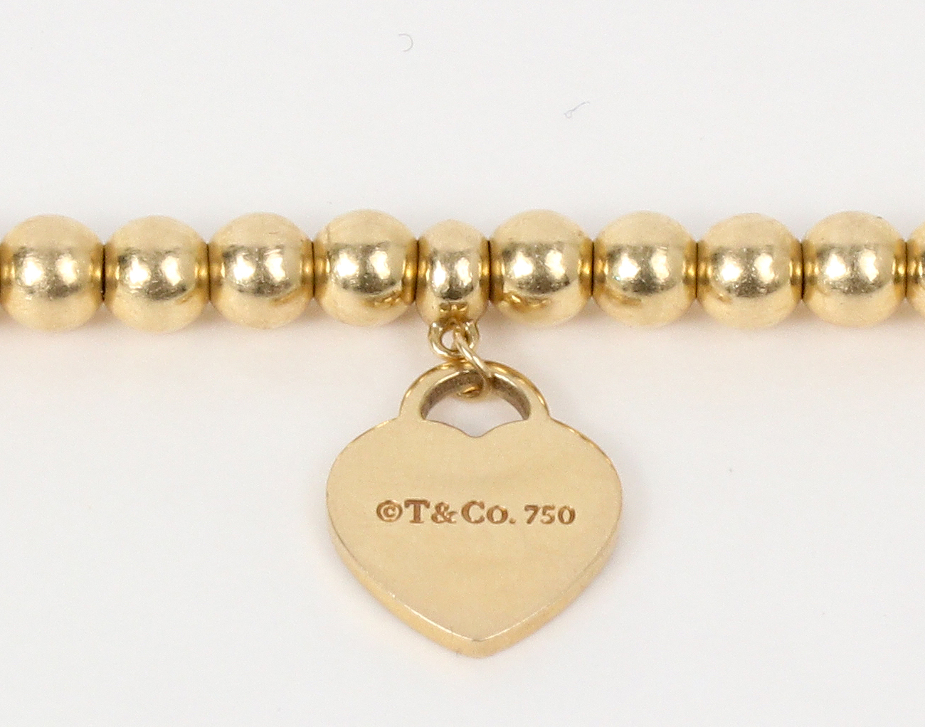티파니앤코 리턴 투 티파니 미니 하트 태그 비드 브레이슬릿 옐로우골드